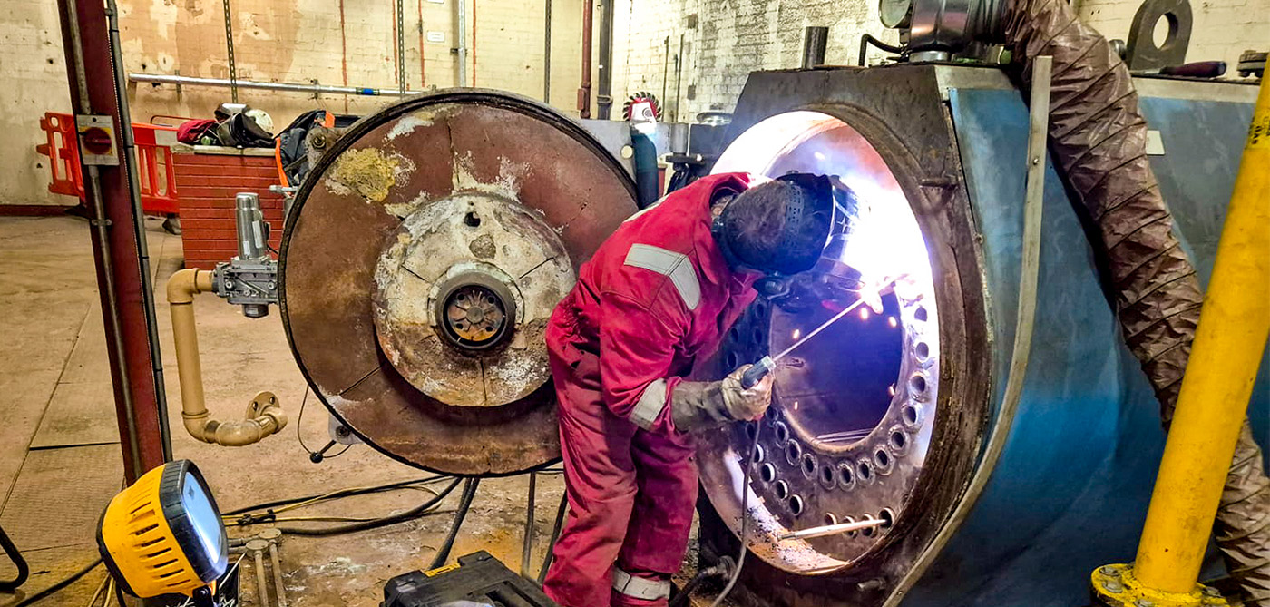 Boiler Retubing Beneath a Busy Manchester Train Station